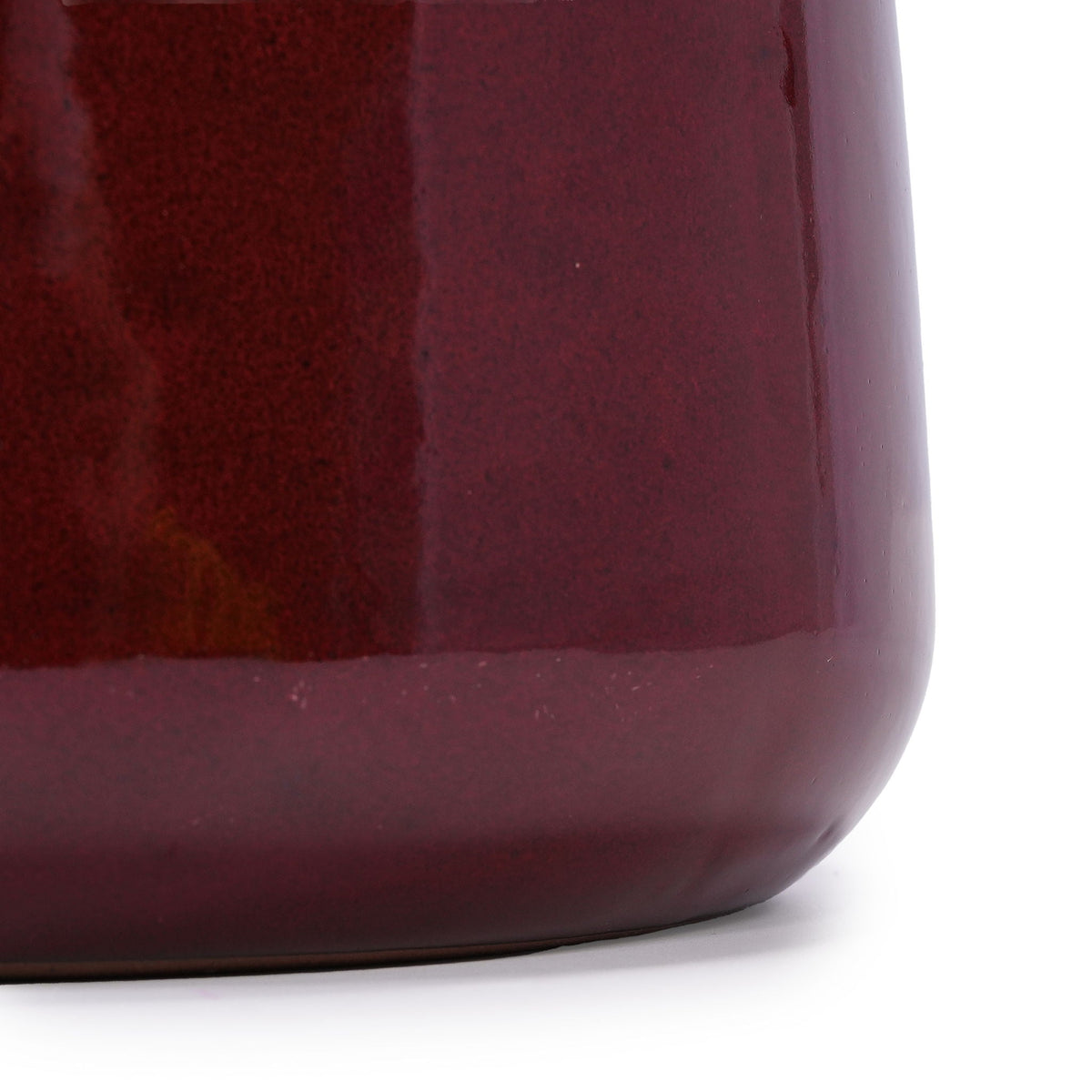 Bean paste red ceramic planter pot with glossy glaze close-up on Tampa Home & Garden Store