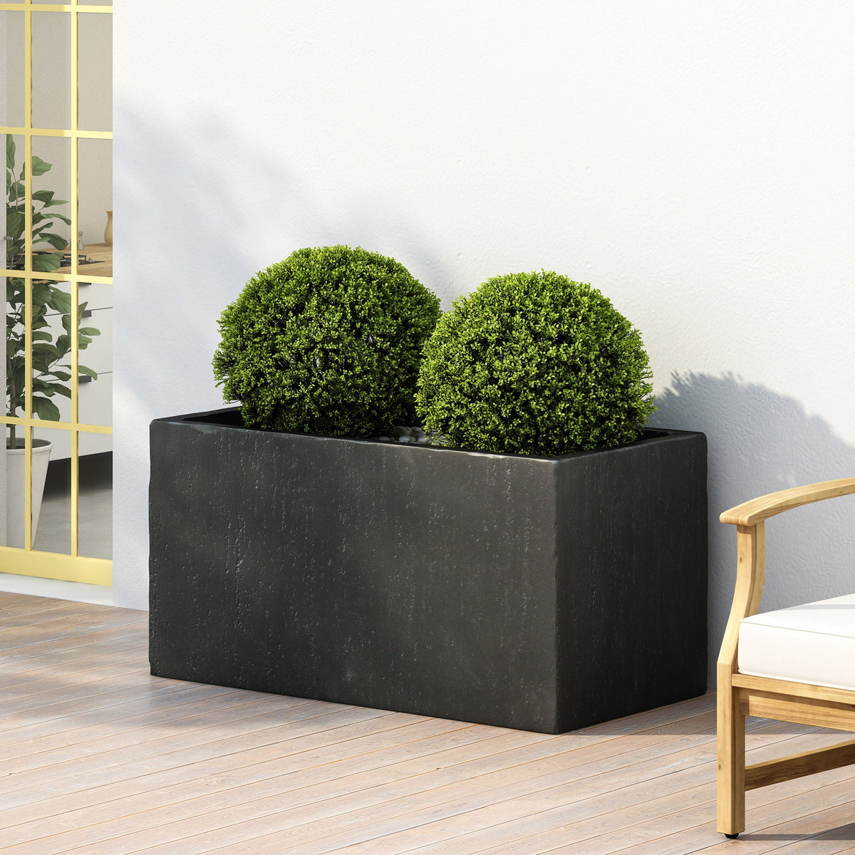 Modern Outdoor Planter by HouseOfZazla black rectangular container with two round boxwoods on Tampa Home & Garden Store