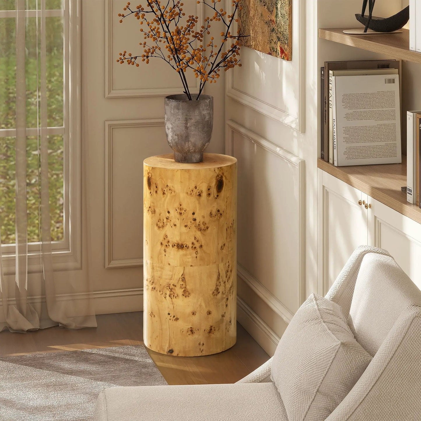 Nebula Accent Pillar Side Table in natural burl wood with orange berry branch arrangement on Tampa Home & Garden Store