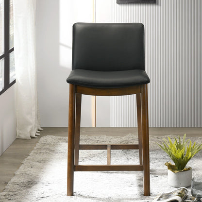 Mid-Century counter chair with full-back, black upholstered seat and wooden legs on Tampa Home & Garden Store