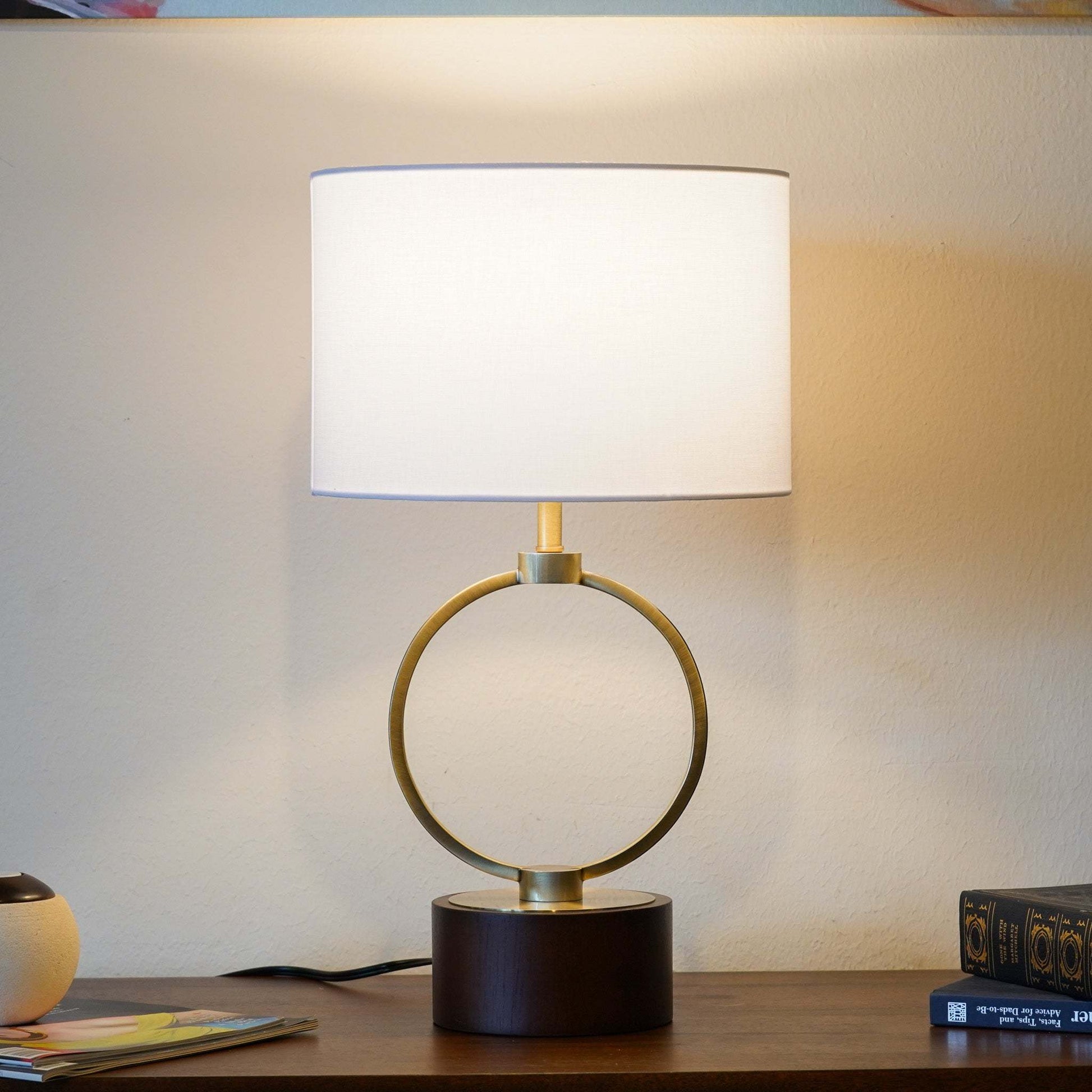 Nordic table lamp with metal circular ring and white shade on a dark base by HouseOfZazla on Tampa Home & Garden Store