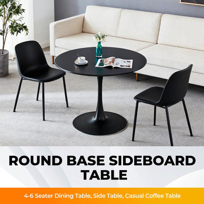 Mid-Century Tulip Dining Table with Round Top in black pedestal base with black chairs on Tampa Home & Garden Store