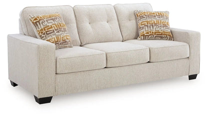 Larimer Sofa, beige textured 3-seat sofa with tufted back and mustard pillows on Tampa Home & Garden Store