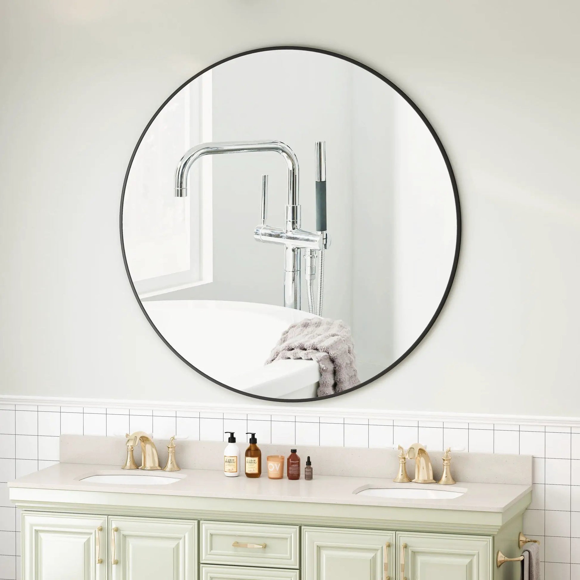 Wall circular mirror by Unique Piece Furniture with black metal frame above a bathroom vanity on Tampa Home & Garden Store