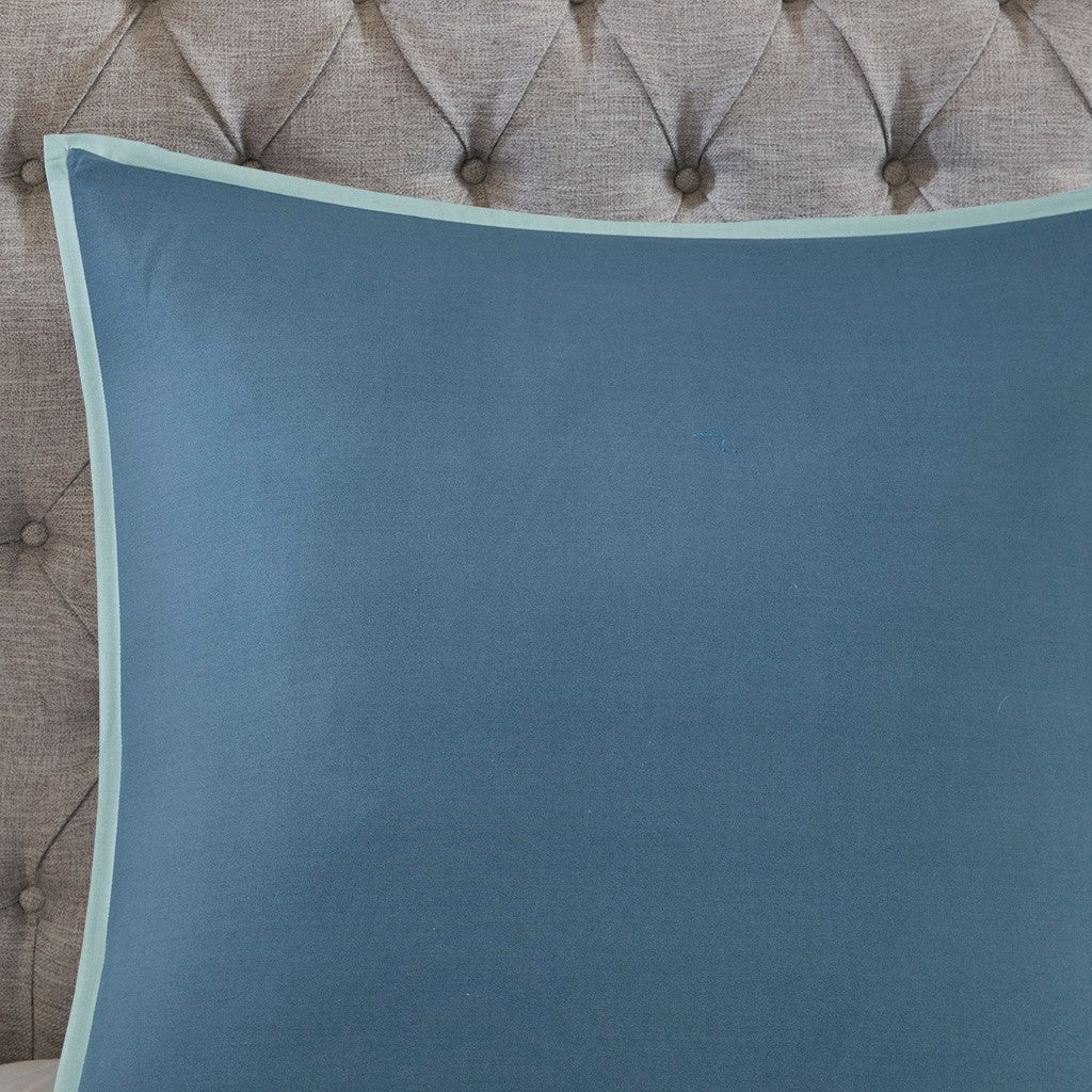 Blue cotton reversible comforter set with light teal piping edge on Tampa Home & Garden Store