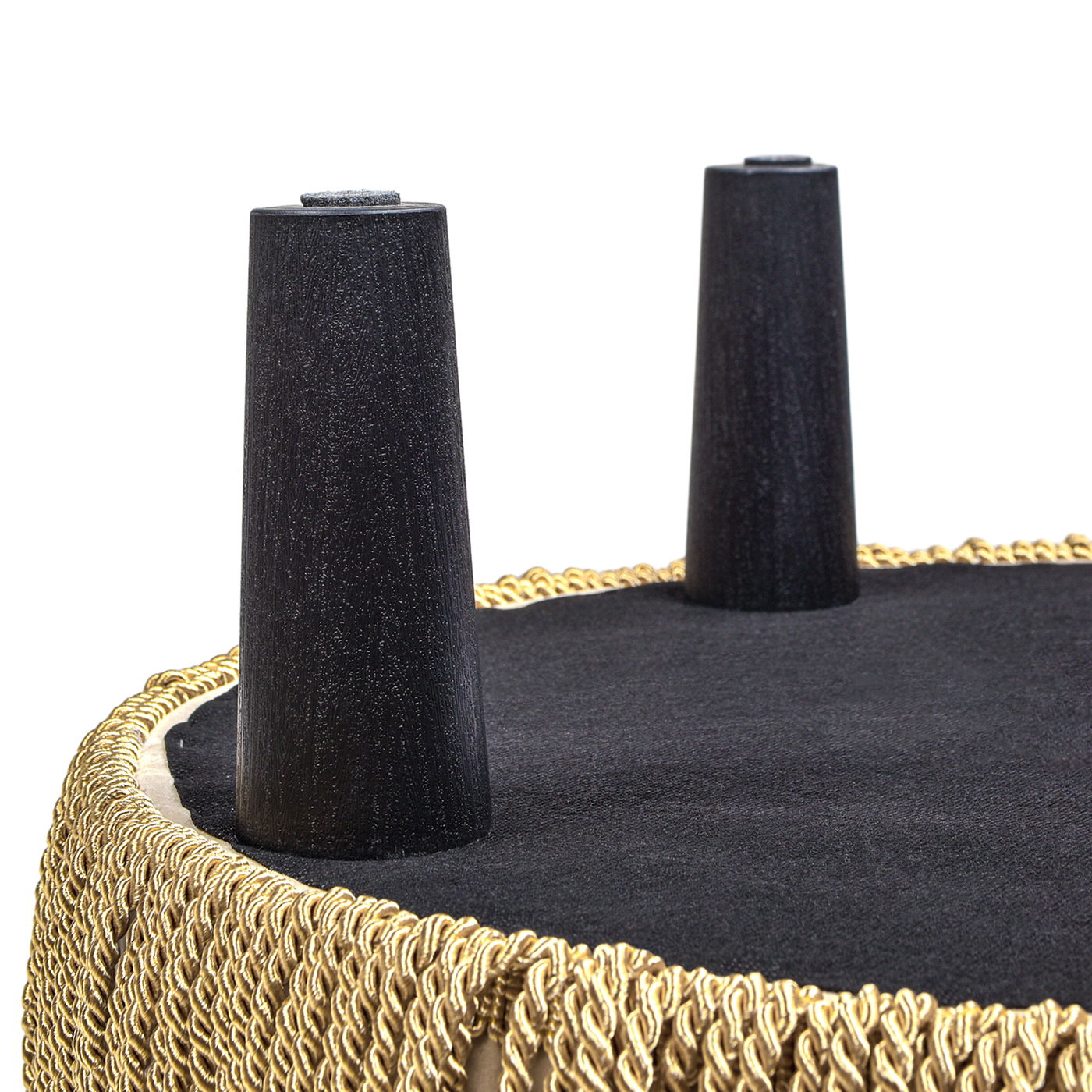 Yolanda Round Upholstered Accent Ottoman in black fabric with gold braided trim on Tampa Home & Garden Store