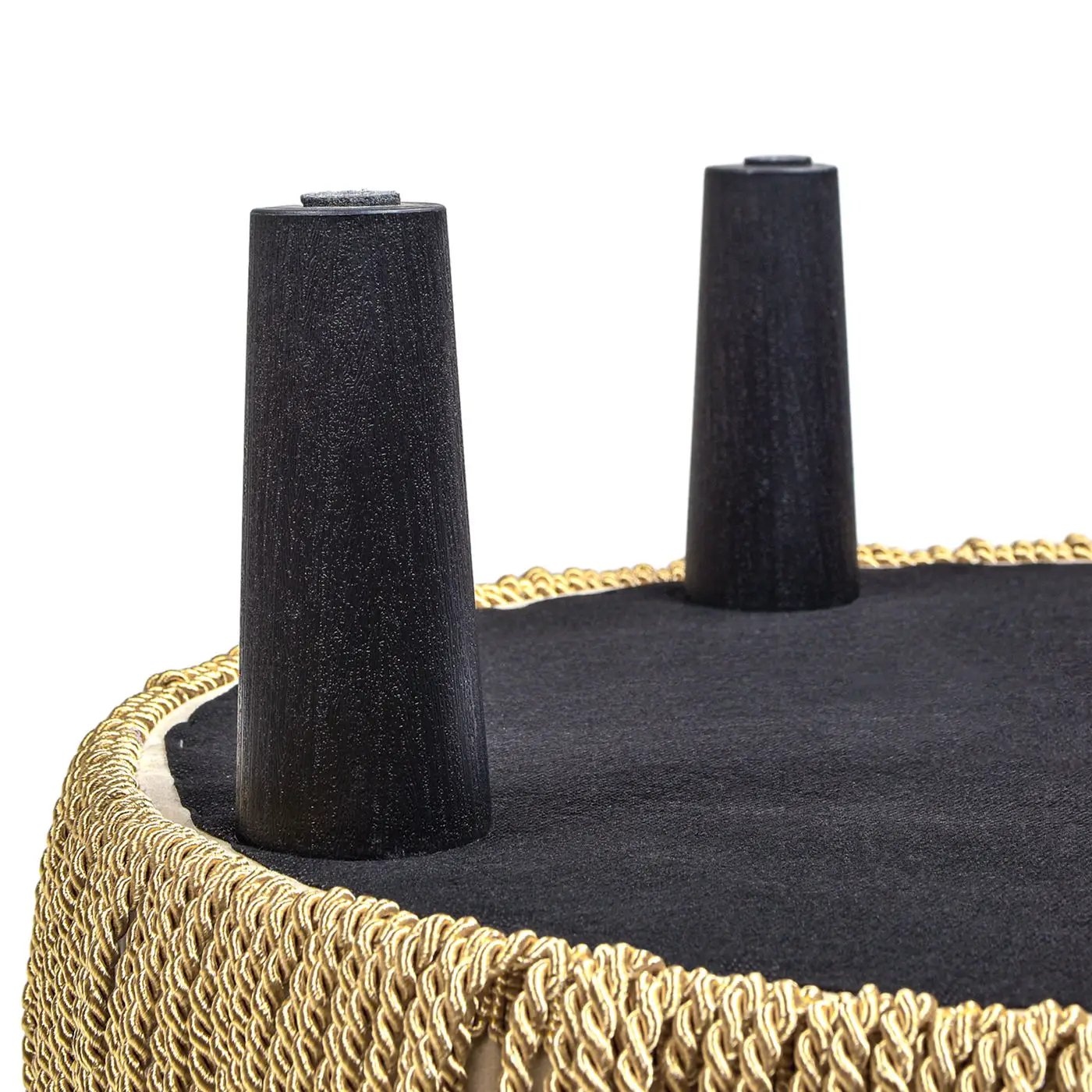 Yolanda Round Upholstered Accent Ottoman in black fabric with gold braided trim on Tampa Home & Garden Store