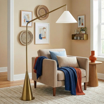 Lisbon floor lamp with antique brass arched stem and white coned shade, on/off switch on Tampa Home & Garden Store