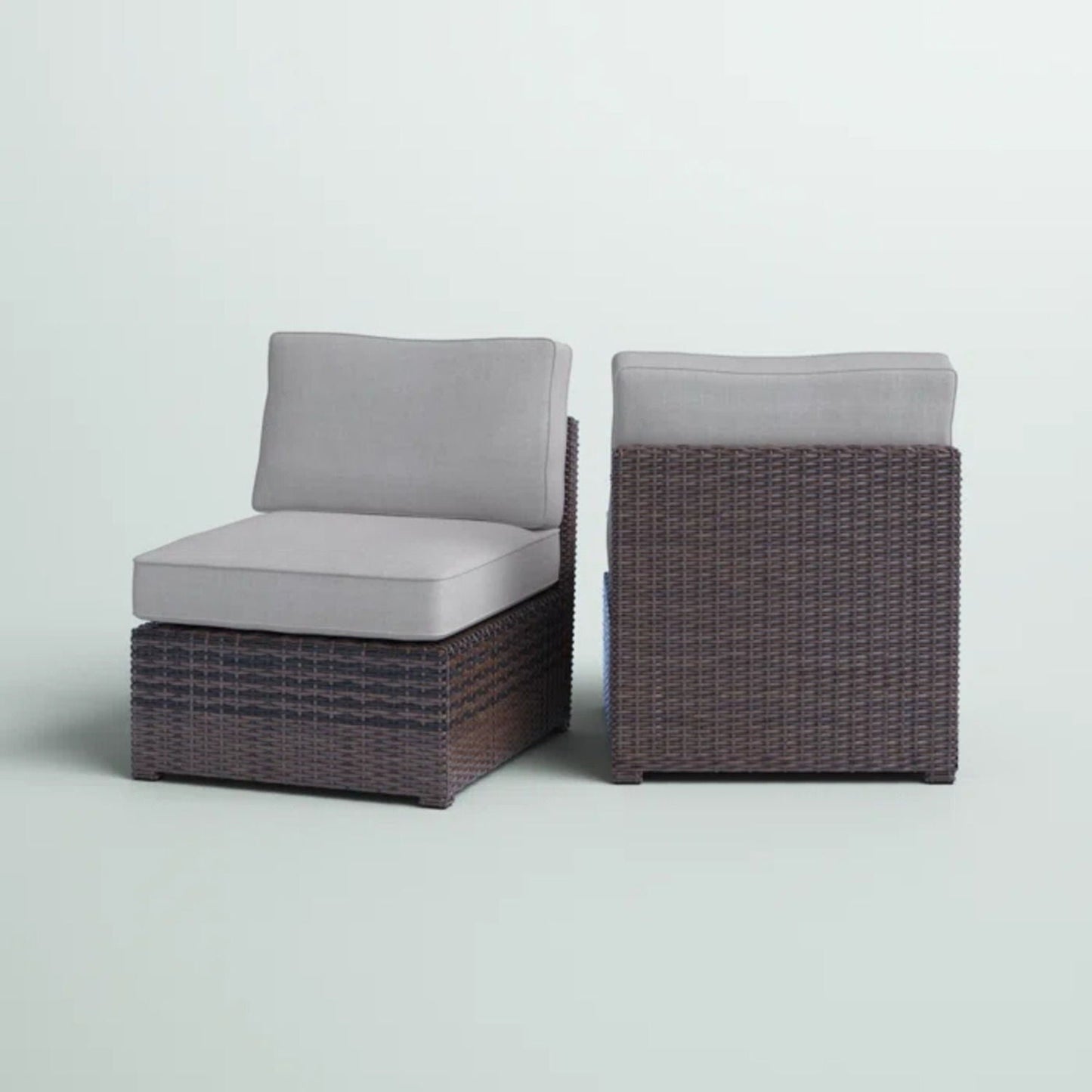 Armless patio chair with cushions, two brown wicker chairs with gray cushions HouseOfZazla on Tampa Home & Garden Store