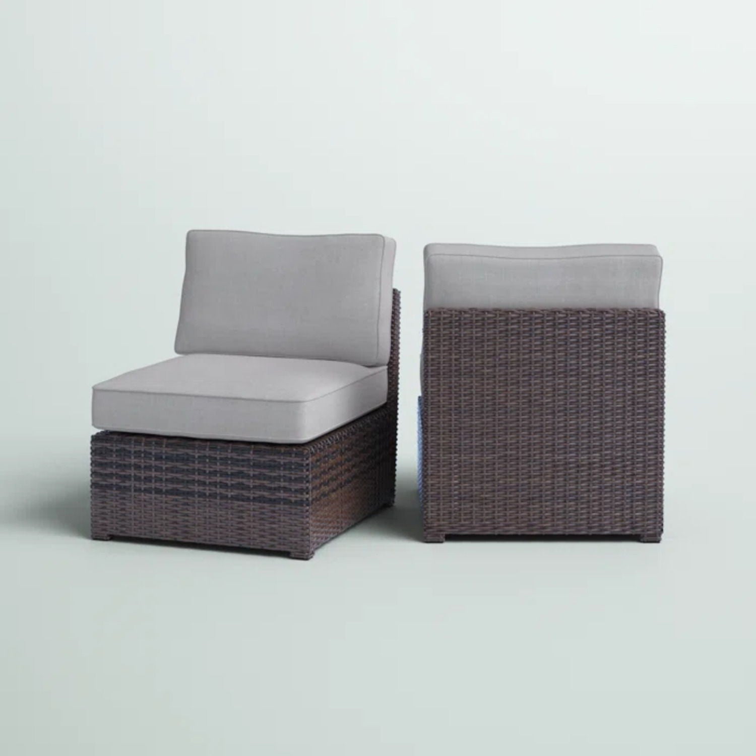 Armless patio chair with cushions, two brown wicker chairs with gray cushions HouseOfZazla on Tampa Home & Garden Store
