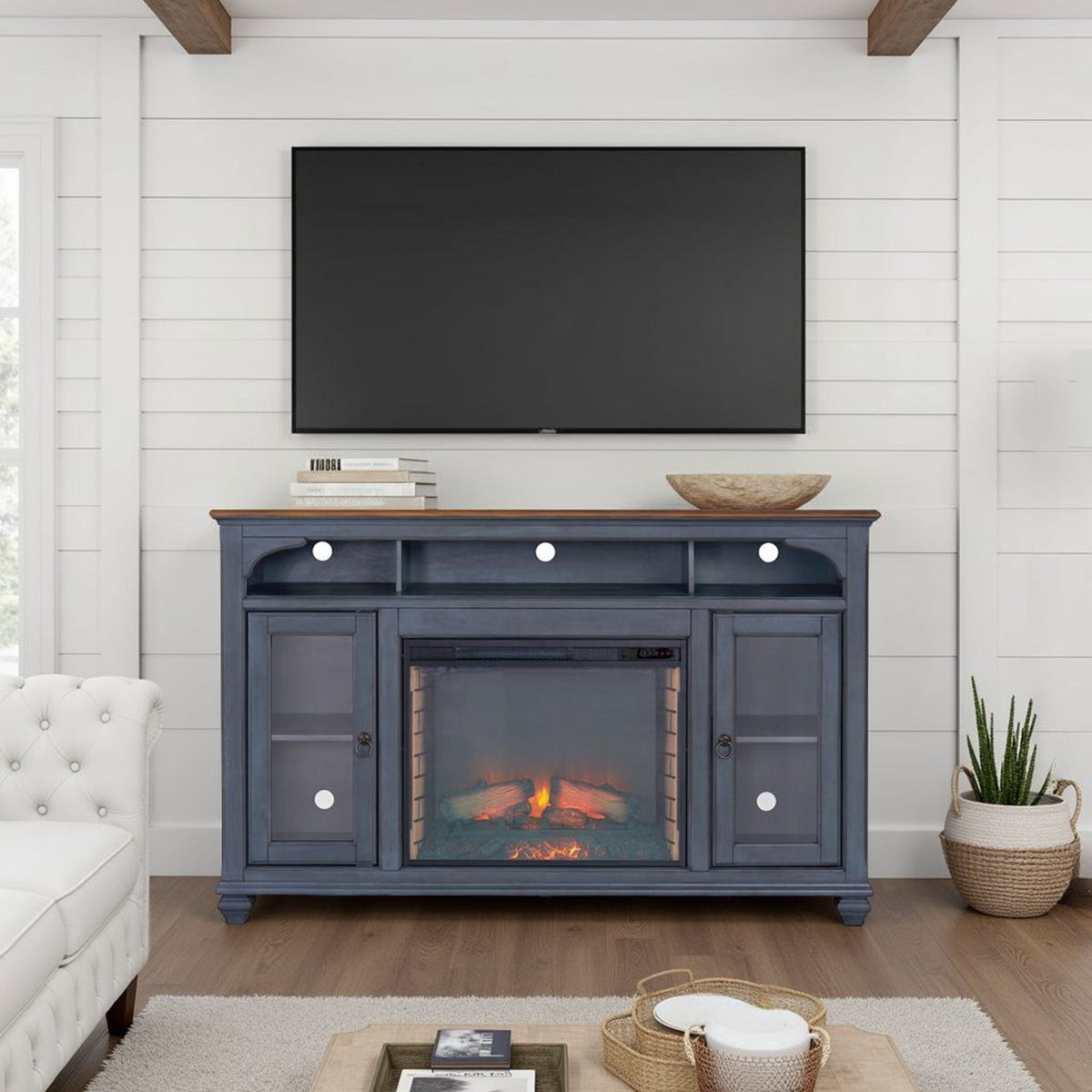 Blue fireplace TV stand with glass-front cabinets and built-in fireplace on Tampa Home & Garden Store