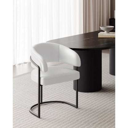 Geometric base dining chair with vegan upholstery in white, curved back, black metal base on Tampa Home & Garden Store