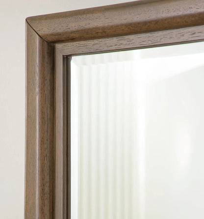 Dresser mirror frame in warm brown wood with visible grain and rounded top molding on Tampa Home & Garden Store