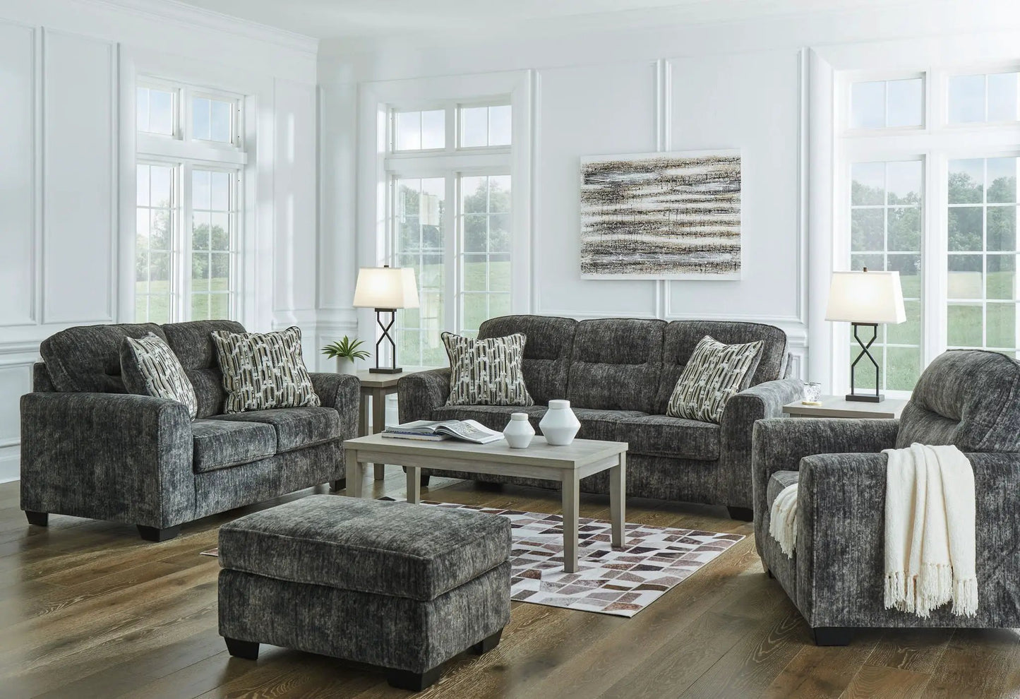 Lonoke Living Room Set by Unique Piece Furniture in gray upholstery with patterned pillows on Tampa Home & Garden Store