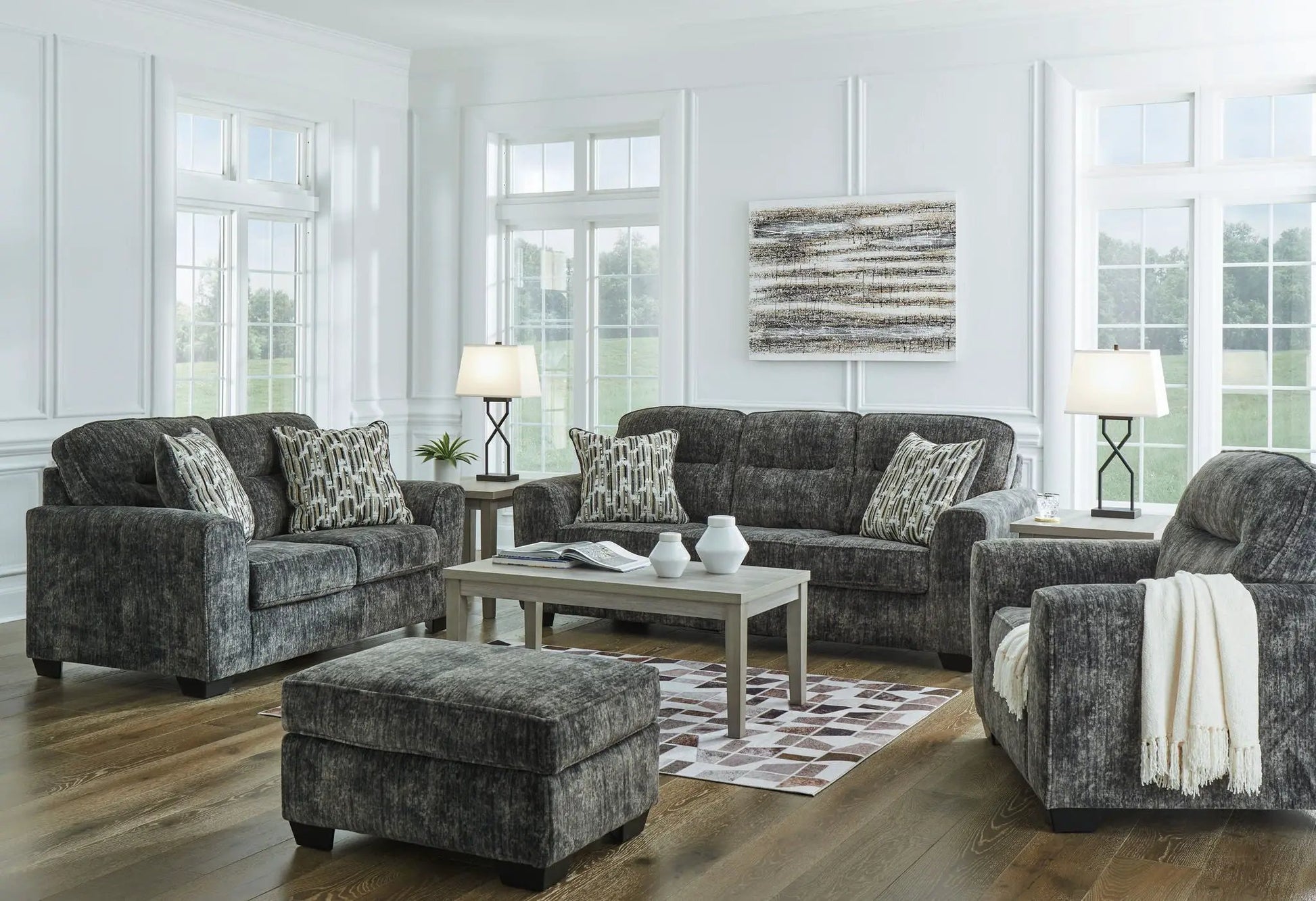 Lonoke Living Room Set by Unique Piece Furniture in gray upholstery with patterned pillows on Tampa Home & Garden Store
