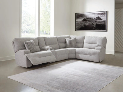 Acklen Place Reclining Sectional in light gray fabric with geometric pillows on Tampa Home & Garden Store