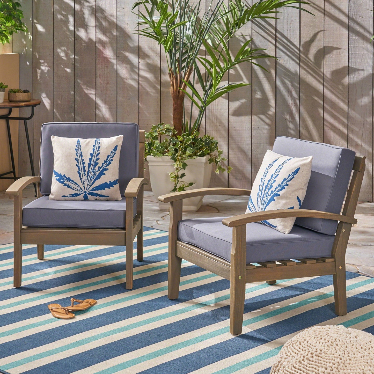 Two HouseOfZazla Peyton Club Chairs in acacia wood with dark gray cushions on Tampa Home & Garden Store