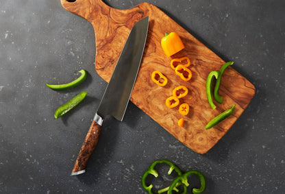 8in Chef Knife STEELPORT on olive wood board with orange pepper rings and green peppers on Tampa Home & Garden Store