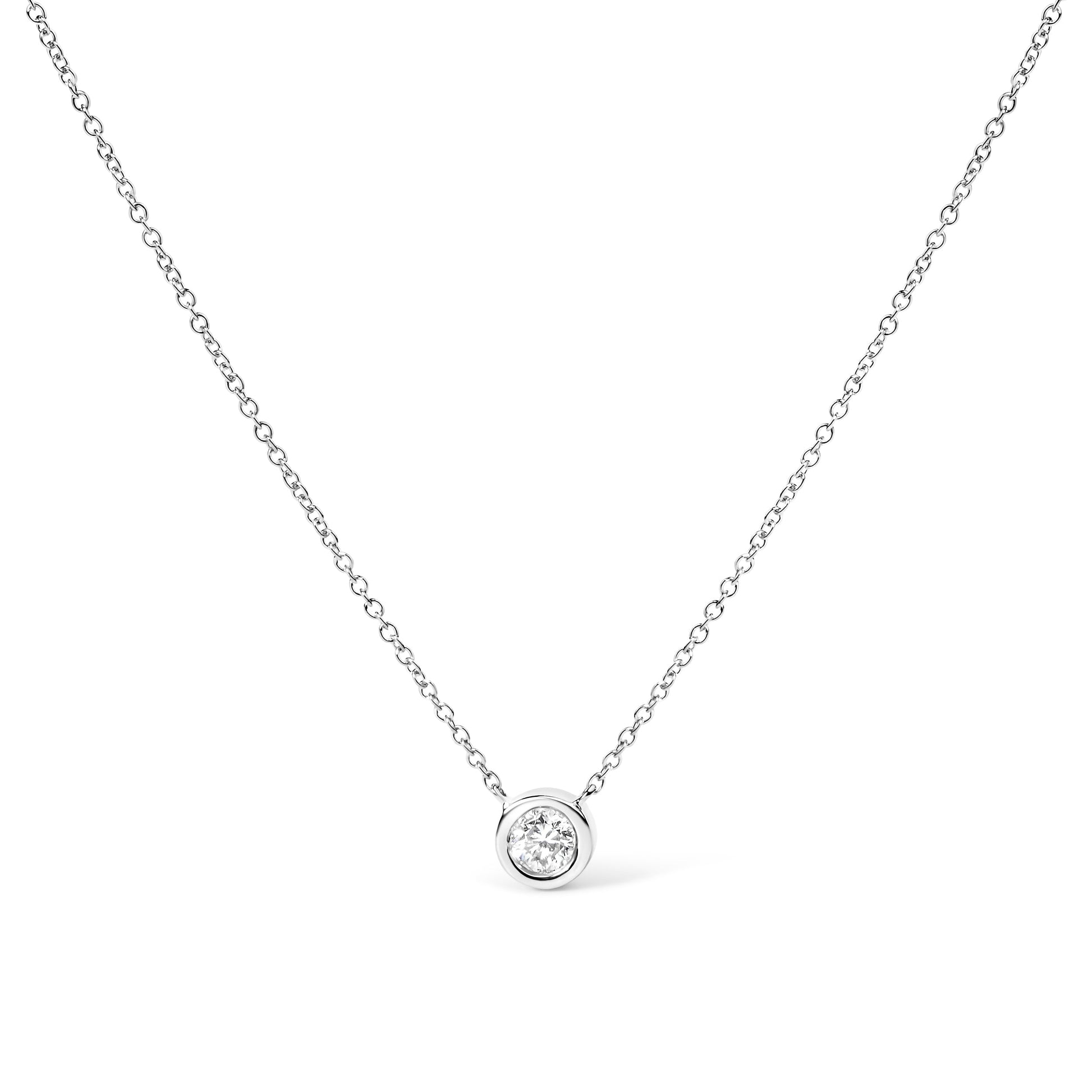 Bezel-set diamond pendant necklace in 10K white gold with 1/10ct round diamond, 16–18 in chain on Tampa Home & Garden Store