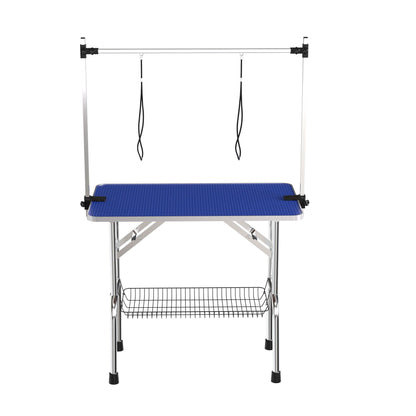 Folding pet grooming table with stainless steel frame, blue mat, adjustable arms and clamps on Tampa Home & Garden Store