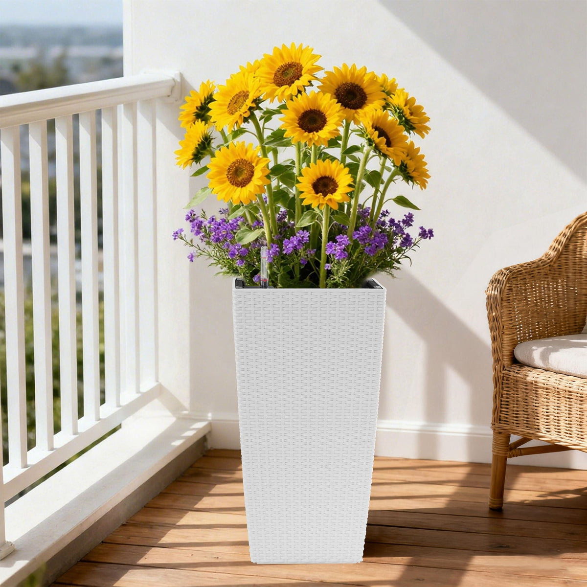 Indoor Outdoor Planter Auto Watering white wicker tall planter with sunflowers on deck on Tampa Home & Garden Store