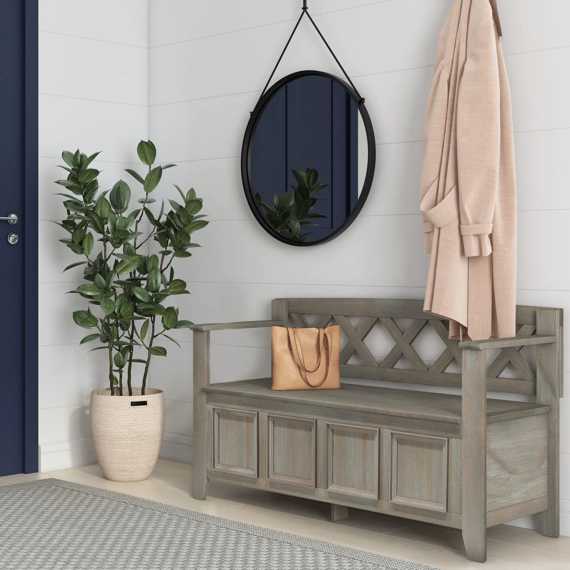 Amherst Handcrafted Entryway Bench in weathered grey wood with storage; round black mirror above on Tampa Home & Garden Store