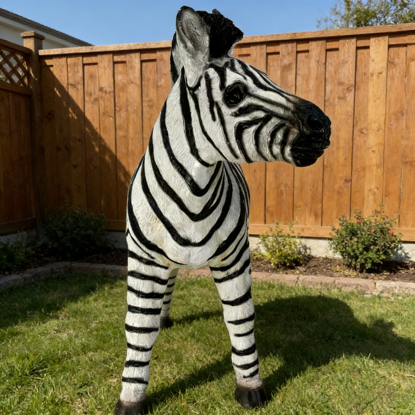 Simulated Zebra Garden Statue 18.31H x 19.49L black and white striped yard sculpture on Tampa Home & Garden Store