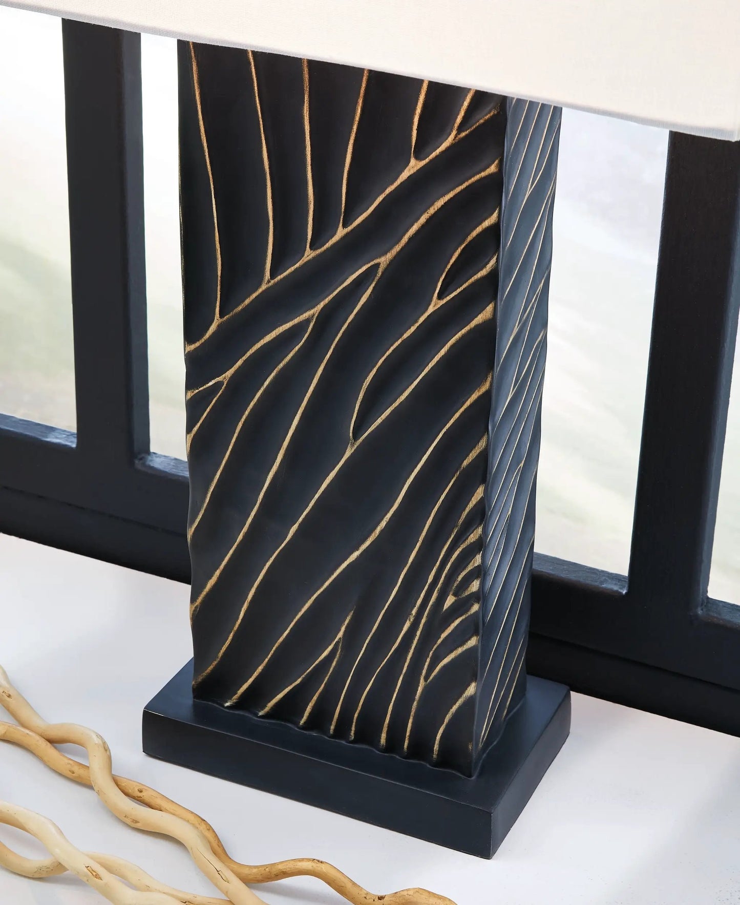 Bartlen Poly Table Lamp in Black and Gold Finish