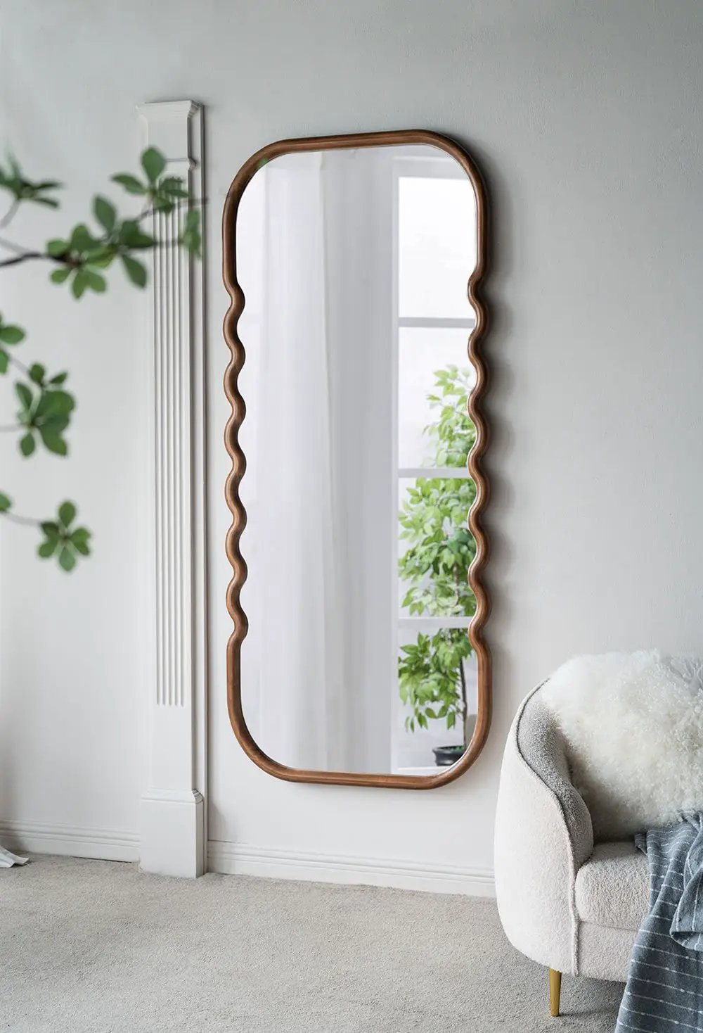 Oversized wooden floor mirror with brown wavy frame on Tampa Home & Garden Store