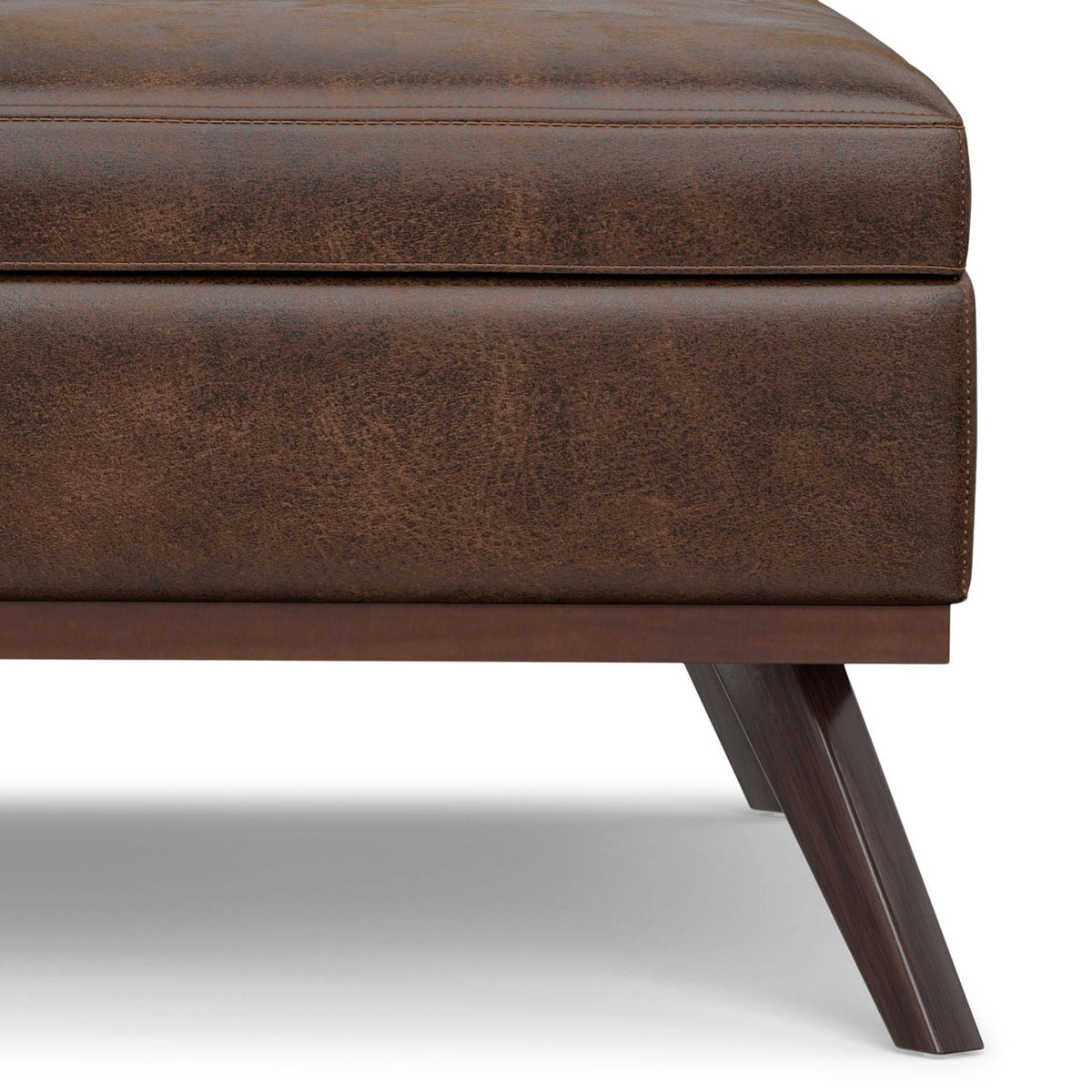 Square lift-top coffee table storage ottoman in brown leather with angled wooden legs on Tampa Home & Garden Store