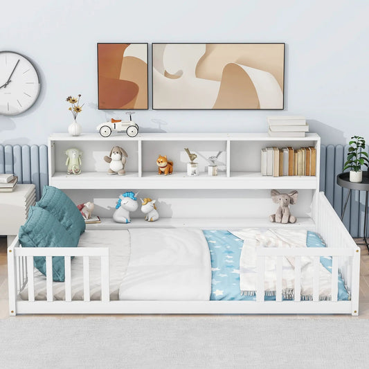 White floor bed with guardrails and built-in side bookcase shelves, two framed art prints on Tampa Home & Garden Store