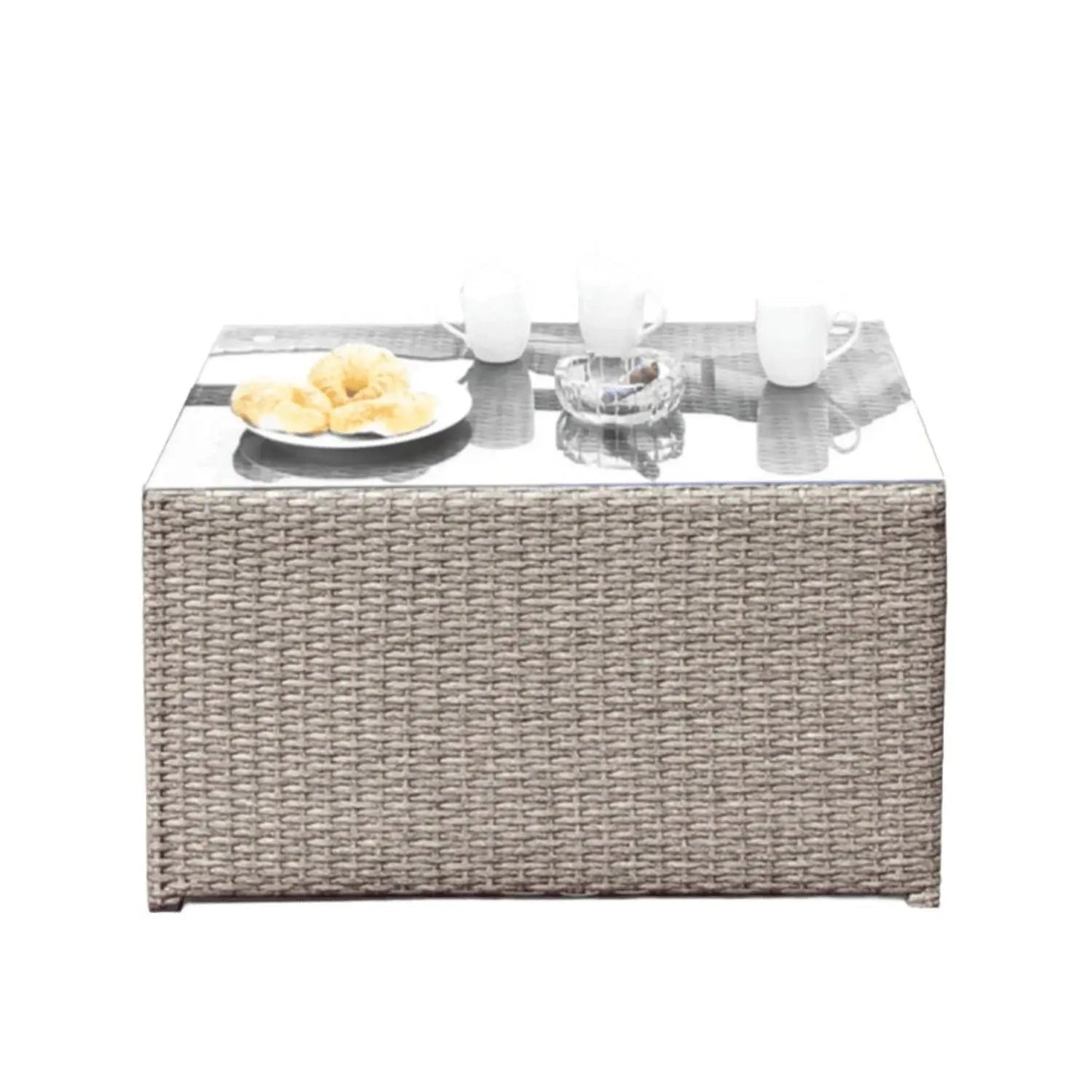 Coffee Table Stylish with glass top and woven wicker base; plate of croissants and 3 white mugs on Tampa Home & Garden Store