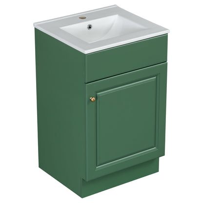 Green bathroom vanity with white sink top and brass knob, cabinet base with adjustable shelf on Tampa Home & Garden Store