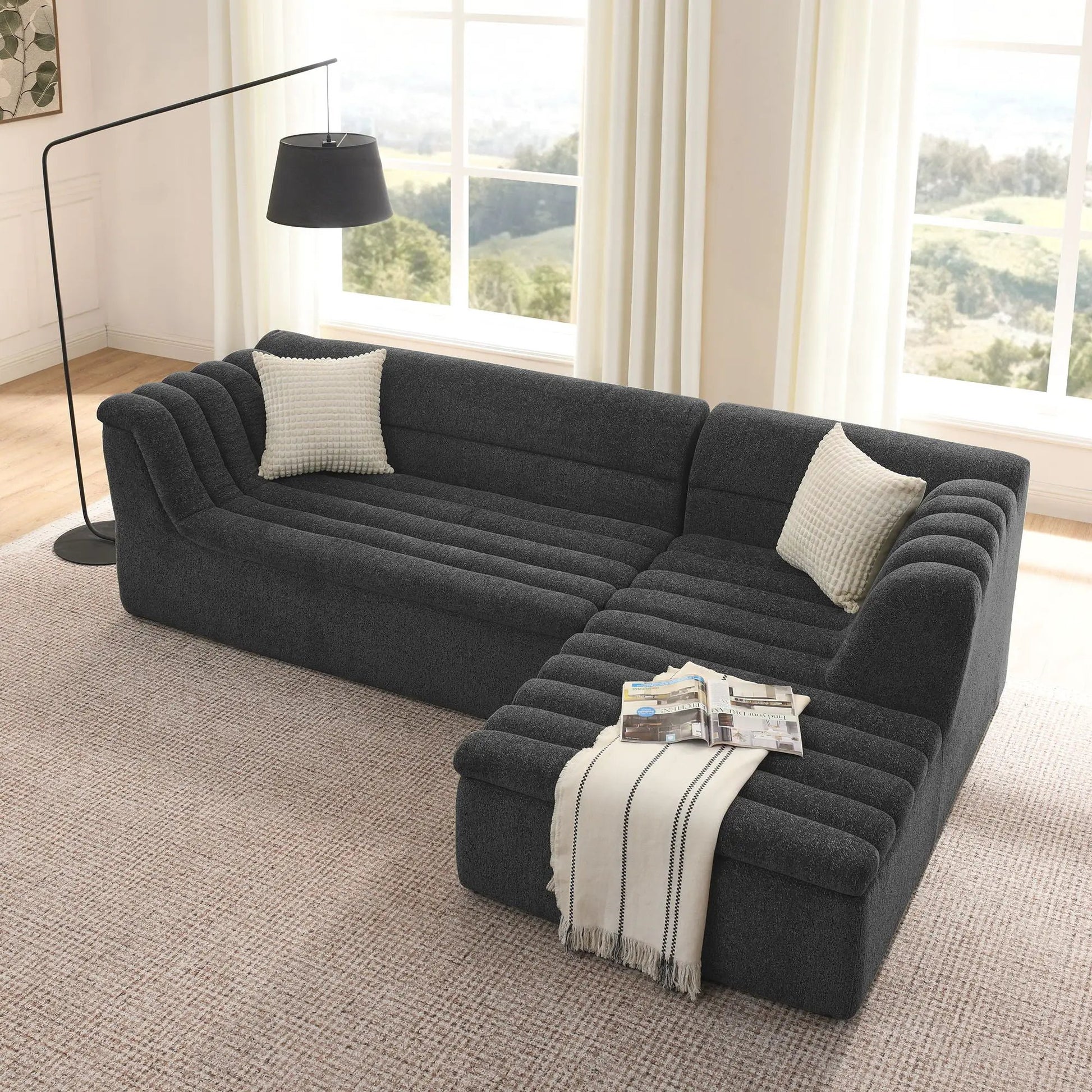 Upholstered L-shaped modular sectional sofa with chaise, charcoal, wave-shaped armrest on Tampa Home & Garden Store