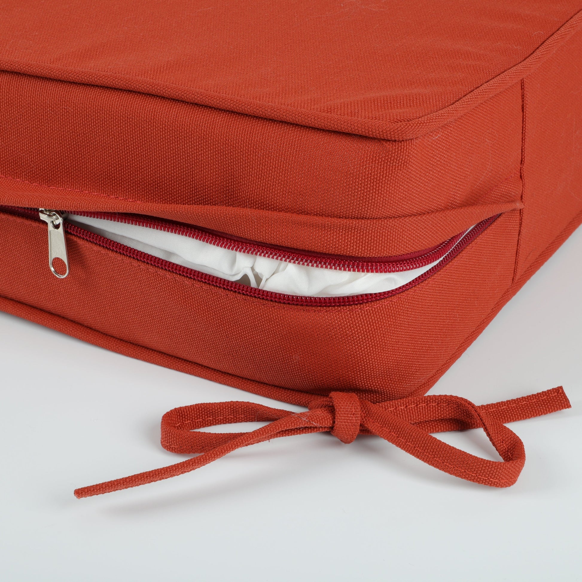 Outdoor Deep Seat Cushions set of 2 in orange textured fabric with red zippers HouseOfZazla on Tampa Home & Garden Store