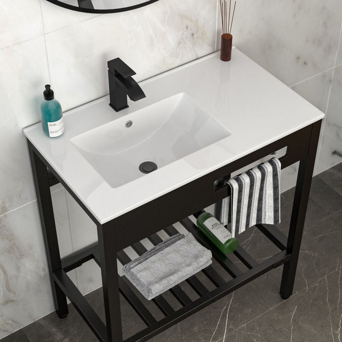 Console sink vanity with white porcelain basin and black matte steel legs in bathroom on Tampa Home & Garden Store