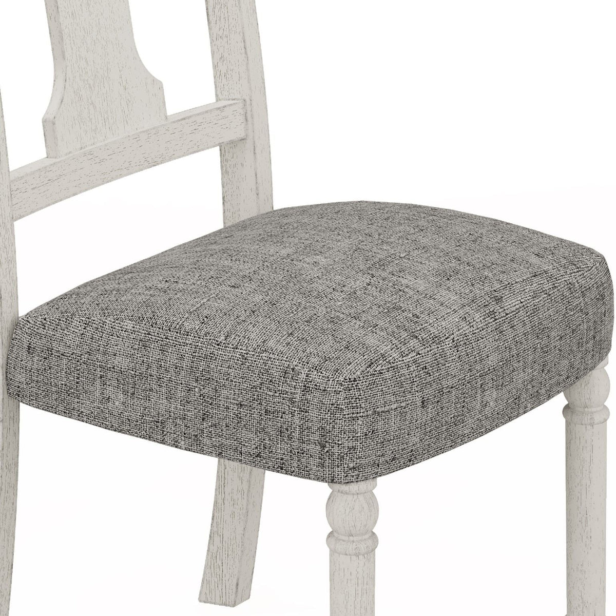 Whitewashed wooden dining chair with gray upholstered seat cushion and turned legs on Tampa Home & Garden Store
