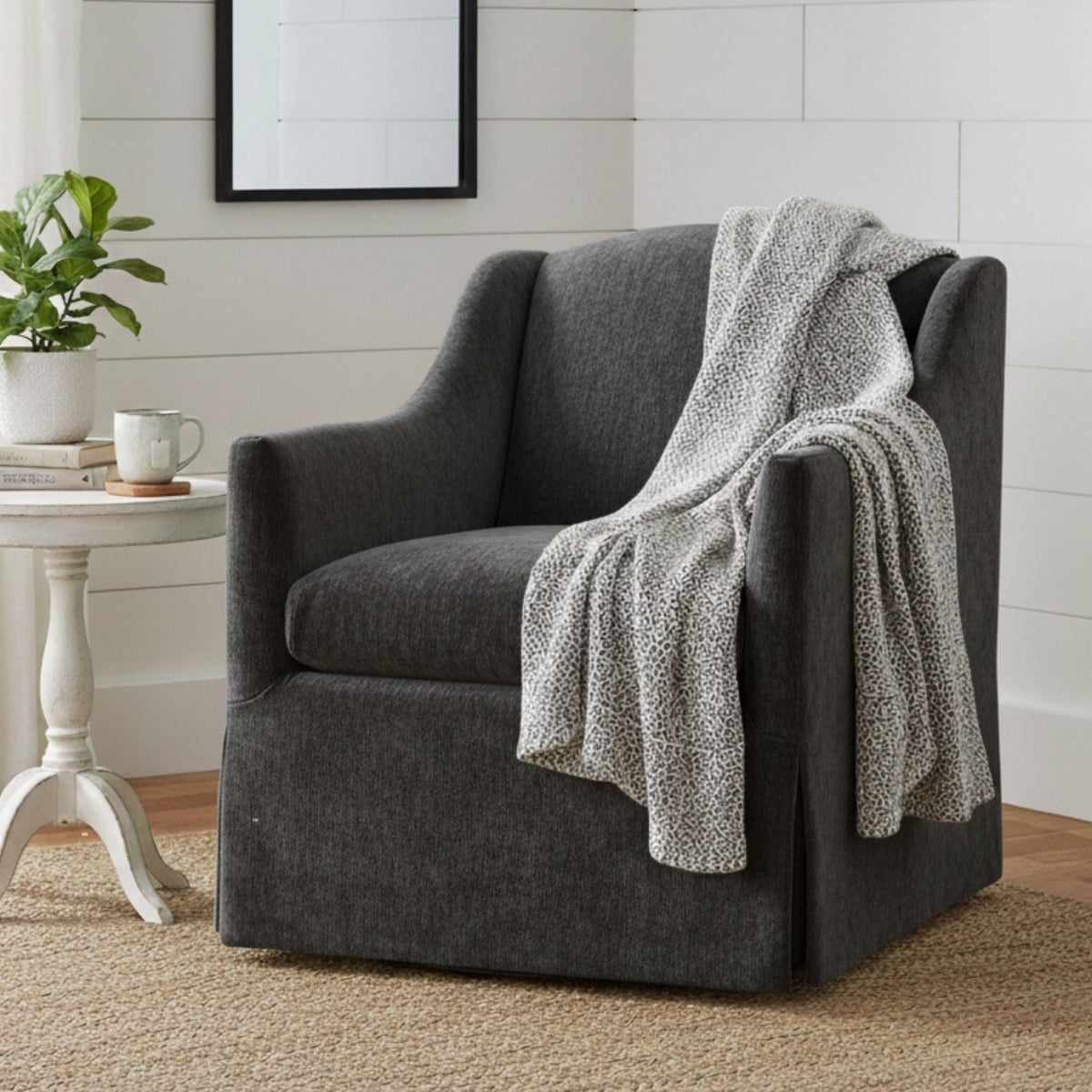Skirted swivel accent chair by HouseOfZazla in charcoal gray fabric with 360° swivel base on Tampa Home & Garden Store