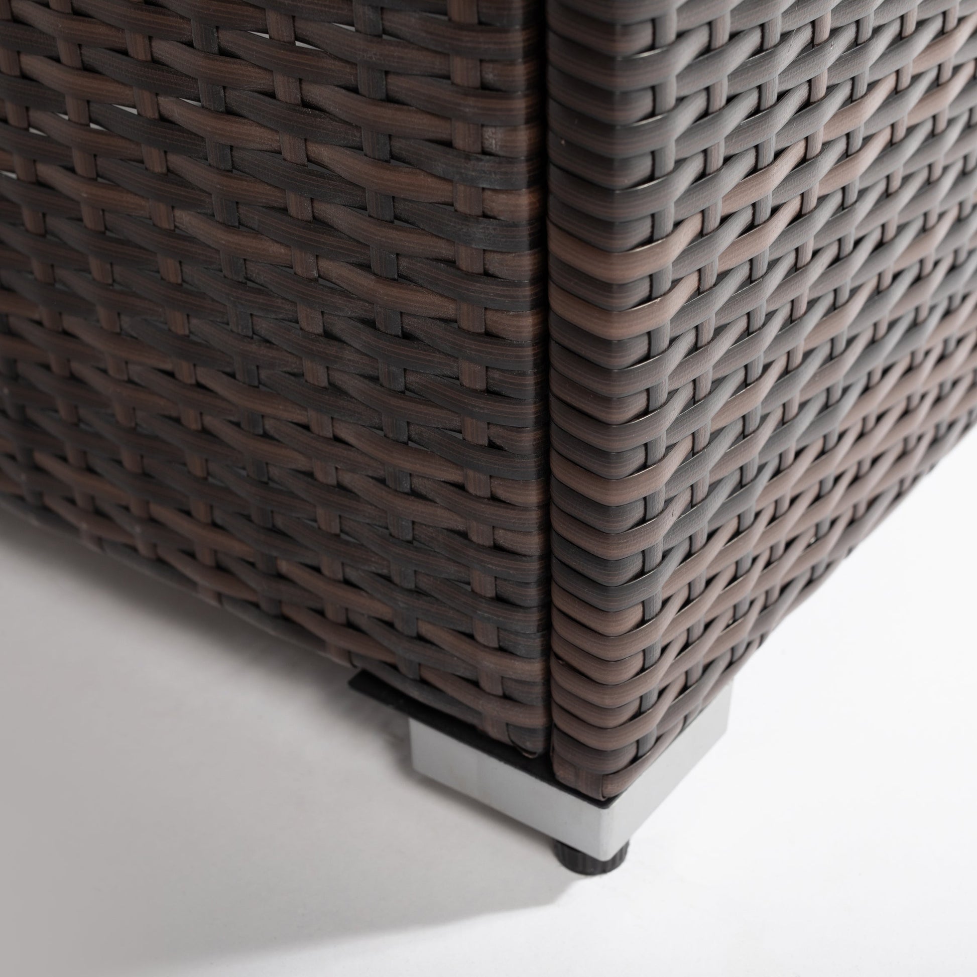 Fire pit table wicker base in dark brown, close-up of woven pattern and metal feet on Tampa Home & Garden Store