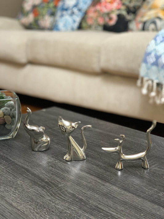 Vibhsa silver dog cat and elephant ring holders set, 3 metal animal figurines on dark wood table on Tampa Home & Garden Store