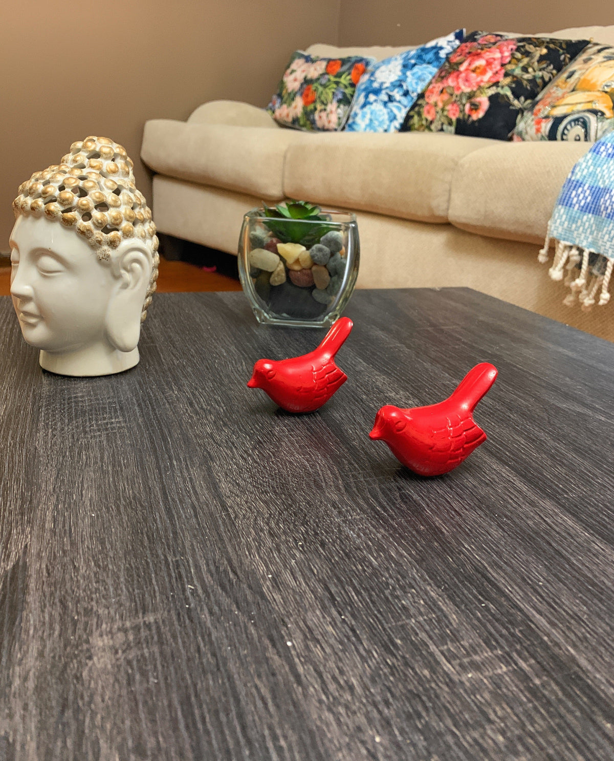 Vibhsa Birds of Health and Happiness red bird figurines (set of 2) on dark wood table on Tampa Home & Garden Store