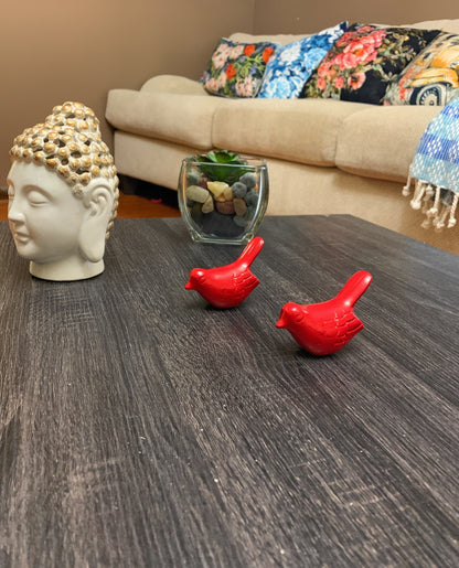 Vibhsa Birds of Health and Happiness red bird figurines (set of 2) on dark wood table on Tampa Home & Garden Store