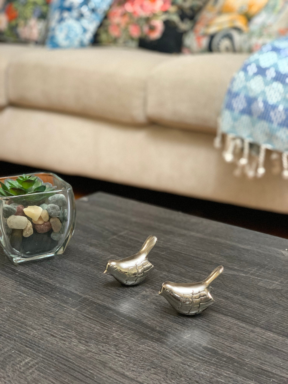Vibhsa Bird Figurines Symbols of Health & Happiness (Silver Rustic) two silver birds on a dark wood table beside a glass succulent terrarium on Tampa Home & Garden Store