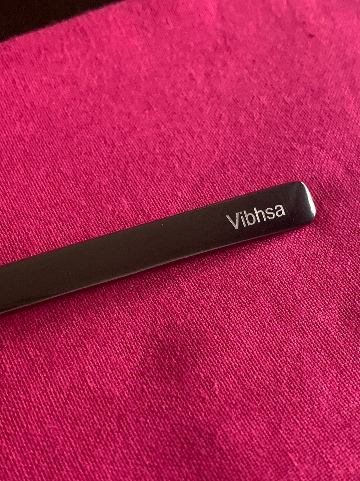 Vibhsa black stainless steel flatware handle close-up on Tampa Home & Garden Store
