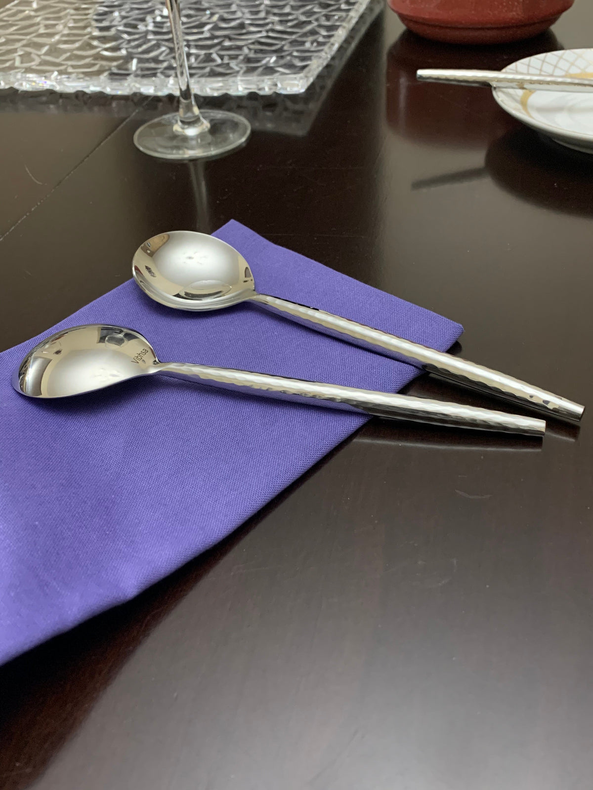 Vibhsa stainless steel spoons set of 6 with twisted handles on purple napkin on Tampa Home & Garden Store