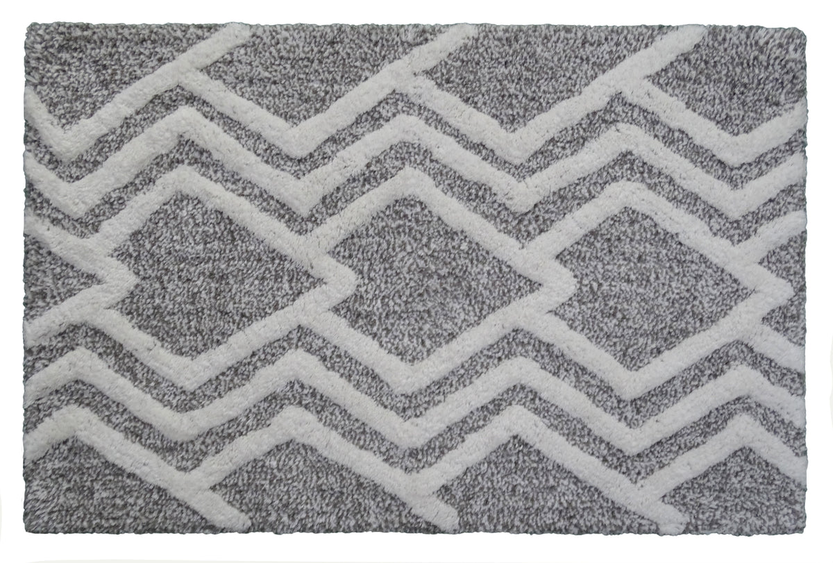 Vibhsa bath rug with grey and ivory chevron geometric pattern, plush tufted texture on Tampa Home & Garden Store