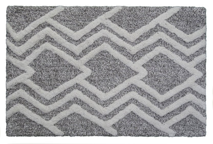 Vibhsa bath rug with grey and ivory chevron geometric pattern, plush tufted texture on Tampa Home & Garden Store