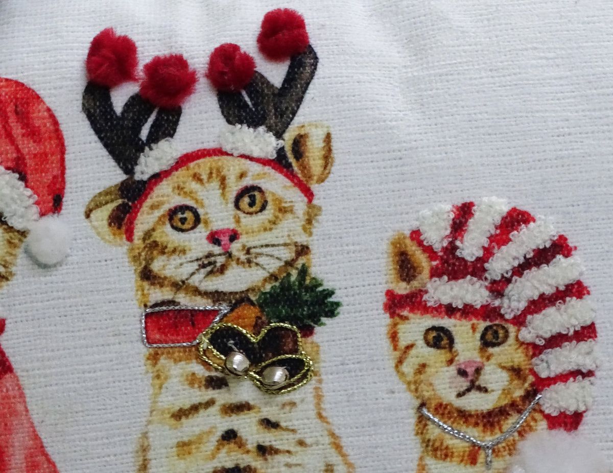 Vibhsa Christmas throw pillow 14x20 with Santa and reindeer print on white fabric on Tampa Home & Garden Store