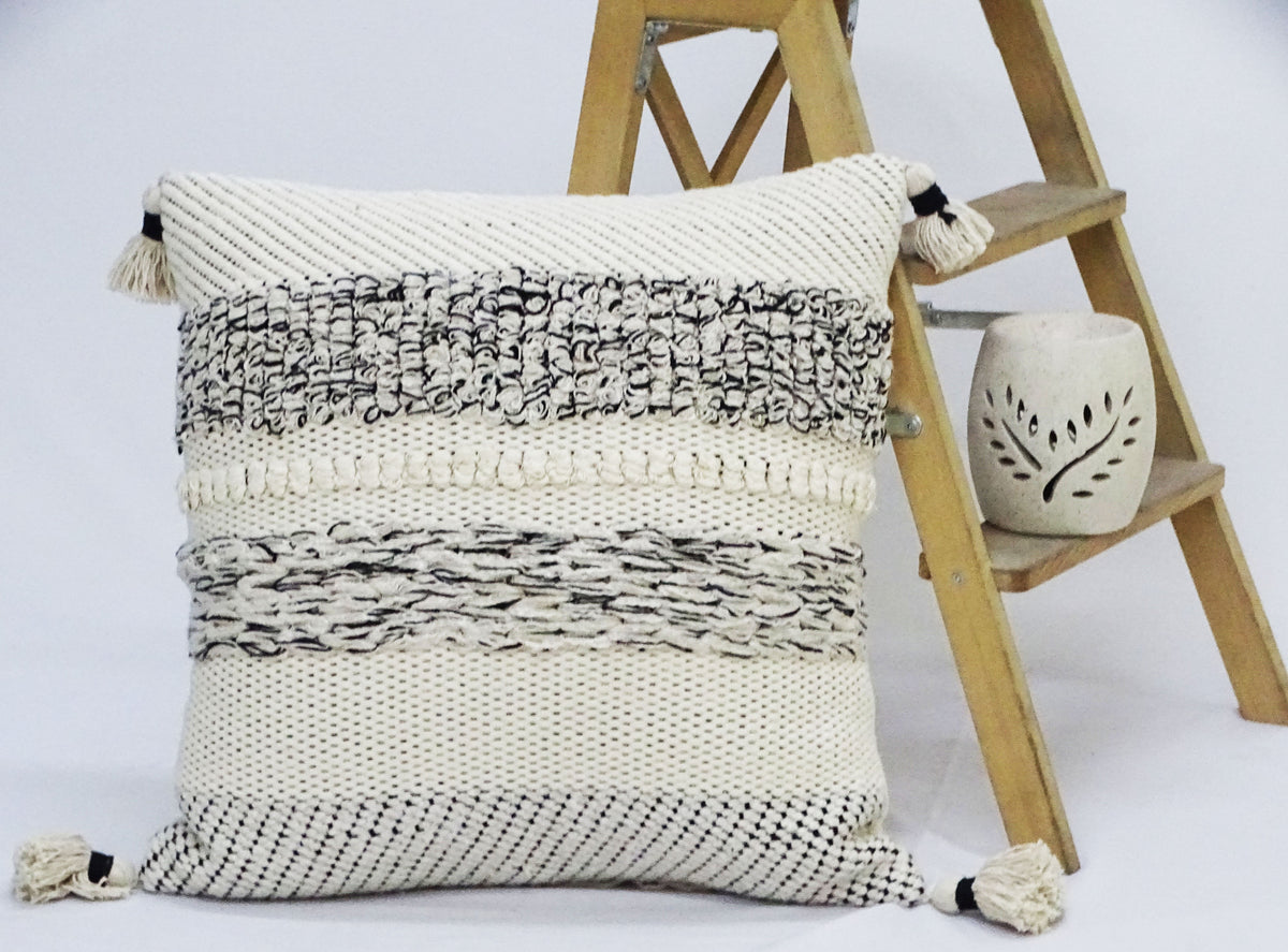 Throw pillow 22x22 by Vibhsa with tassels in cream and black woven pattern on Tampa Home & Garden Store