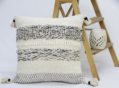 Throw pillow 22x22 by Vibhsa with tassels in cream and black woven pattern on Tampa Home & Garden Store